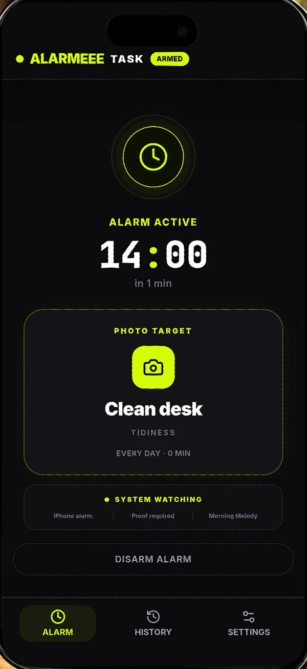 Alarmeee active alarm screen with a clean desk selected as the photo task.