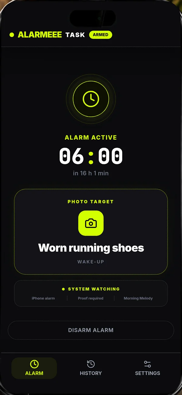 Alarmeee ringing alarm screen at 06:00 with running shoes as the photo task.